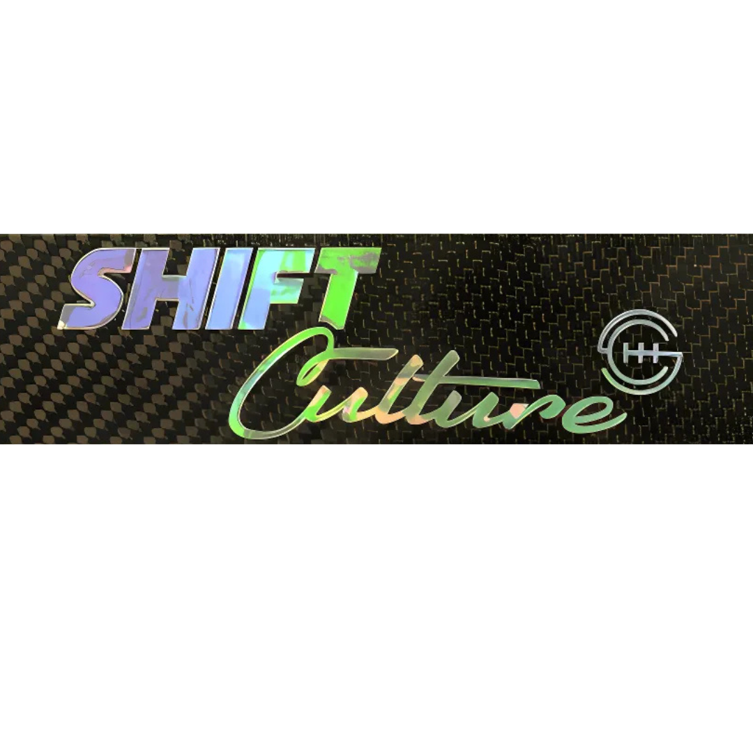 Shift Culture rectangular slap sticker featuring the brand logo in holographic iridescent block letters and script on a black carbon fiber textured background with a circular icon.